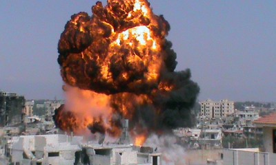 epa03314391 CAPTION CORRECTION: corrects epa image epa03314127. A video grab made from a handout video made available by Shaam News Network on 22 July 2012 shows smoke rising from the site of bomb explosion in Cura district, Homs, Syria. According to media reports on 22 July, Syrian helicopter gunships on 22 July bombarded a rebellious area in the capital Damascus, said the opposition, hours before a meeting of the Arab League foreign ministers on the 17-month conflict. Unspecified casualties occurred when the helicopters shelled the district of Barza, which has been the scene of heavy fighting between President Bashar al-Assad?s forces and rebels in the past three days, reported the opposition Syrian Observatory for Human Rights.  EPA/SHAAM MEWS NETWORK/HANDOUT CAPTION CORRECTION: to correct location and source. TURKEY OUT HANDOUT EDITORIAL USE ONLY/NO SALES/NO ARCHIVES.  EPA IS USING AN IMAGE FORM AN ALTERNATIVE SOURCE, THEREFORE EPA COULD NOT CONFIRM THE EXACT DATE AND SOURCE OF THE IMAGE. HANDOUT EDITORIAL USE ONLY/NO SALES/NO ARCHIVES