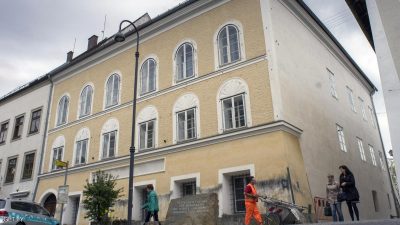 TO GO WITH STORY BY NINA LAMPARSKI A memorial stone stands outside the house where Adolf Hitler was born in Braunau Am Inn, Austria on April 18, 2015. The weatherworn, three-storey structure in the central square of Braunau has stood empty since 2011 and cannot be knocked down because it is a listed building, although not because of Hitler. AFP PHOTO/JOE KLAMAR        (Photo credit should read JOE KLAMAR/AFP/Getty Images)