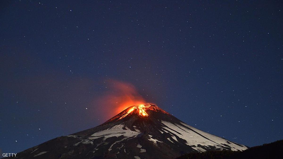 Picture of the Villarrica volcano, located near Villarrica 1200 km from Santiago, in southern Chile, which began erupting on March 3, 2015 forcing the evacuation of some 3,000 people in nearby villages. The Villarrica volcano, one of Chile's most active, began erupting around 3:00 am (0600 GMT), prompting authorities to declare a red alert and cancel classes in schools, the National Emergency Office said.   AFP PHOTO /ARIEL MARINKOVIC        (Photo credit should read ARIEL MARINKOVIC/AFP/Getty Images)